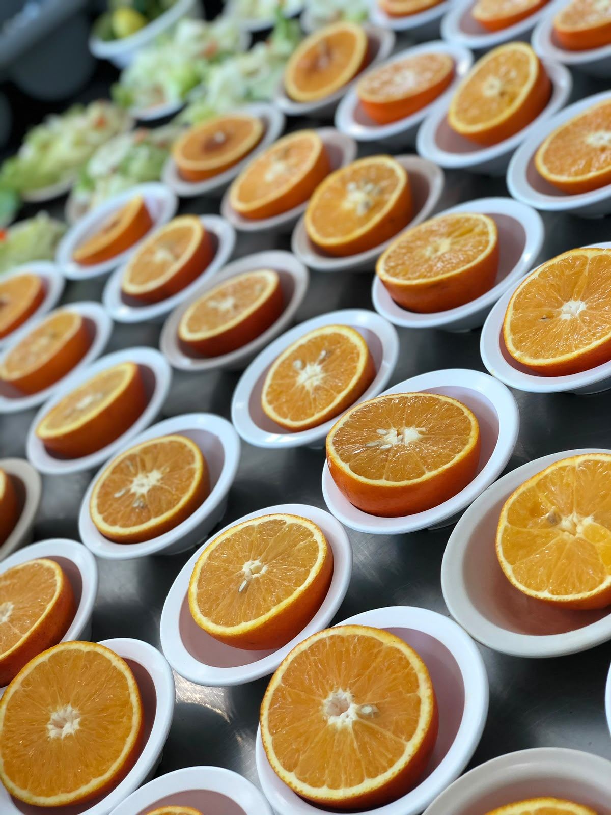 Naranjas porcionadas para servicio a gran escala, Grupo Rico